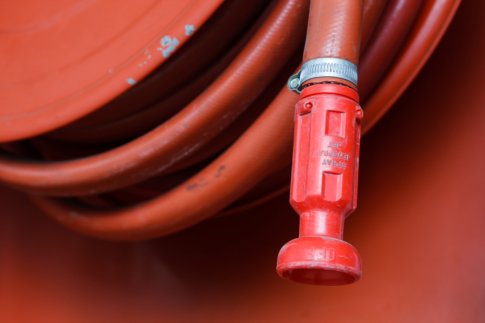 red-fire-hose-in-the-reel